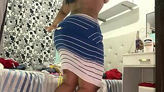 Hidden Camera Catches Latina in Dress and Panties in Private Room