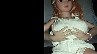 Camille, the sex doll model wears a white halter top during a photoshoot