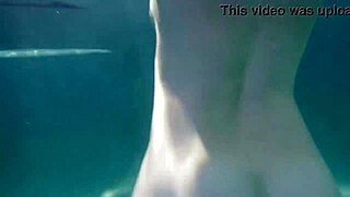Blonde Babe Sunny Lane Sucks Cock Underwater in Sensual POV Scene. Her Small Tits Shine Outdoors.
