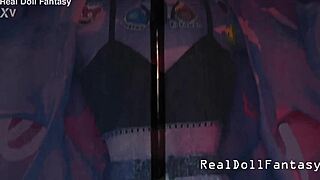 These massive sex doll tits on the Asian model blow my mind in this fetish clip.